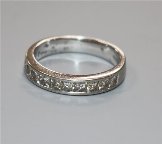 A modern Chisolm Hunter platinum and ten stone princess cut diamond half eternity ring, size O